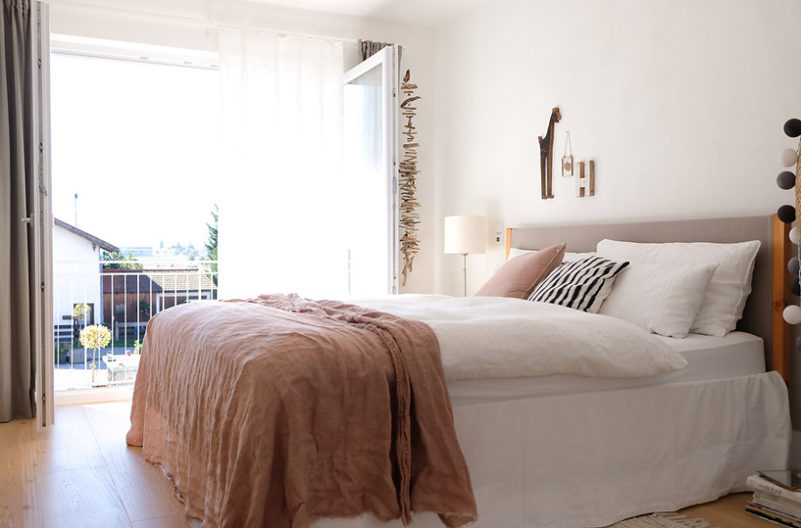 Casa Coulon- Interior Design Inspirations for Your Home Planung DHH Oberland bedroom in neutral tones, here we see the bed and a window to the outside.  casa coulon Casa Coulon- Interior Design Inspirations for Your Home BB Casa Coulon