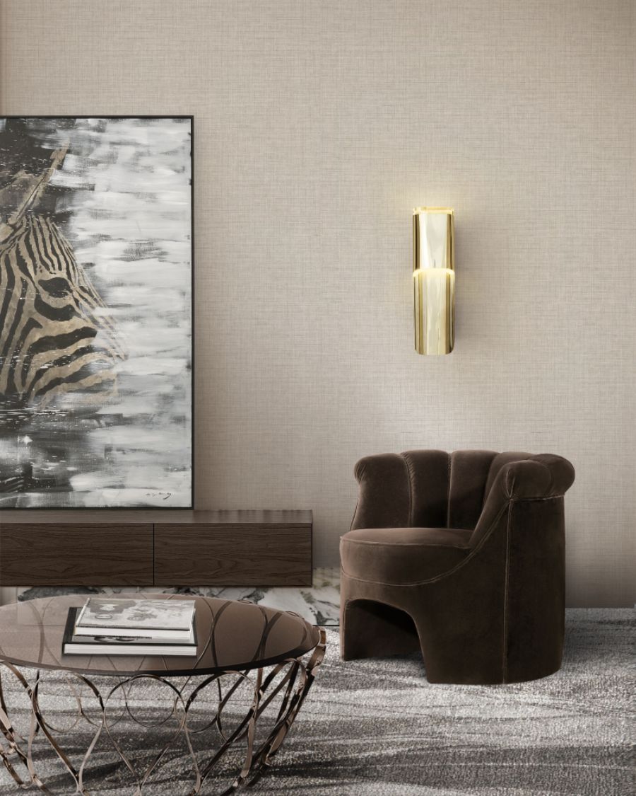 brown velvet armchair, brown coffee table, golden wall lamp