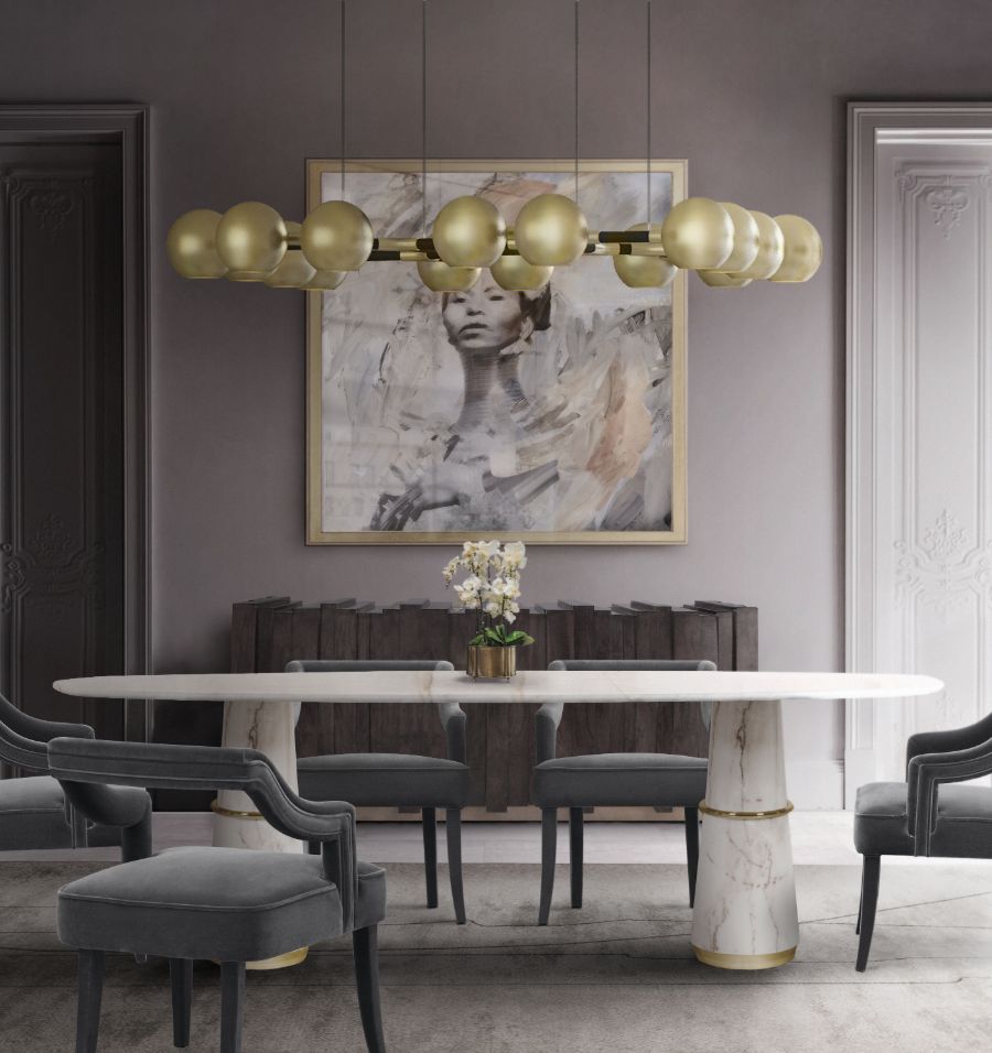 contemporary dining room design with gold round suspesnion light and grey velvet dining chairs modern lighting ideas for the dining room Modern Lighting Ideas for the Dining Room Modern Lighting Ideas for the Dining Room 4