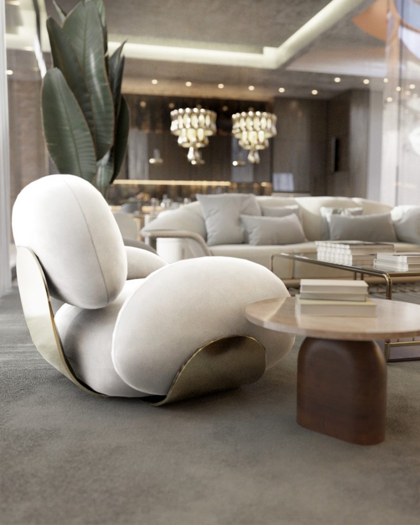armchair and side table in neutral tones and wooden touches modern sofas for living rooms Modern Sofas Inspiration for Your Living Room EH5 819x1024