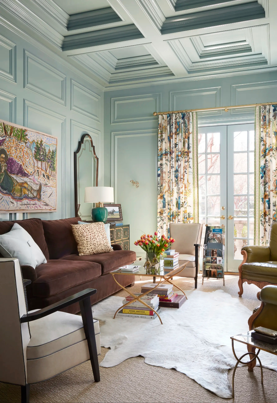 Interior Design Ideas by Jan Showers. A living room in blue tones. There's a two seat brown sofa, two white armchairs, and two green single sofas.  interior design Interior Design Ideas by Jan Showers Preston Hollow Estate Interior Design Ideas by Jan Showers
