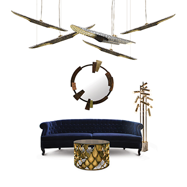 Recalling the chesterfield classic sofa, this blue velvet sofa is the major piece in any living room set. The set is arranged in perfect harmony around the sofa, with a coffee table, a round mirror, a brass floor lamp and a suspension light.